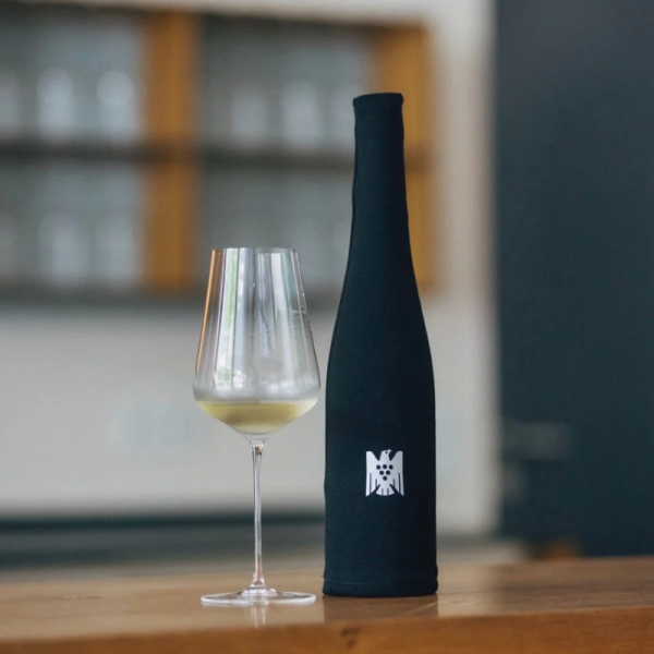A black fabric sleeve has been slipped over a wine...